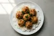 Turkey meatballs served with steamed rice and parsley